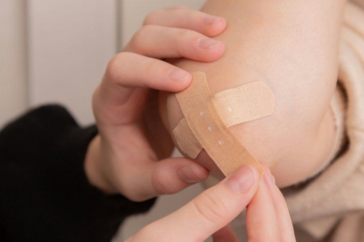 Who invented the Band-Aid and why?
